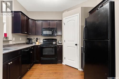 100W 1300 Stockton Street N, Regina, SK - Indoor Photo Showing Kitchen