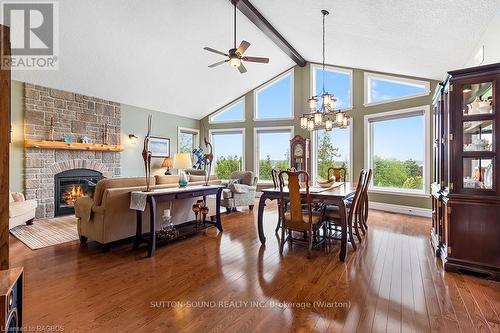 136 Sunset Boulevard, Georgian Bluffs, ON - Indoor Photo Showing Dining Room With Fireplace