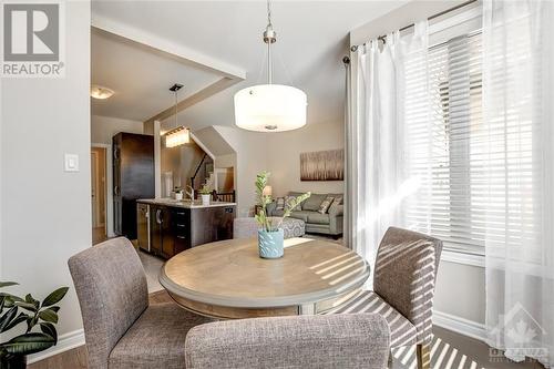 Open Concept Living, Dining, Kitchen with Nat Gas Fireplace - 816 Loosestrife Way, Ottawa, ON - Indoor Photo Showing Dining Room