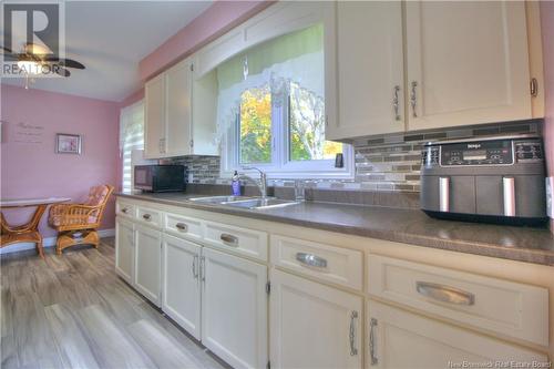 9833 Route 134, Aldouane, NB - Indoor Photo Showing Kitchen With Double Sink