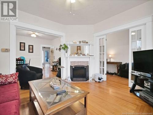 33-35 Princess, Moncton, NB - Indoor Photo Showing Living Room With Fireplace