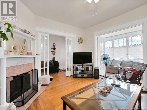 33-35 Princess, Moncton, NB - Indoor Photo Showing Living Room With Fireplace