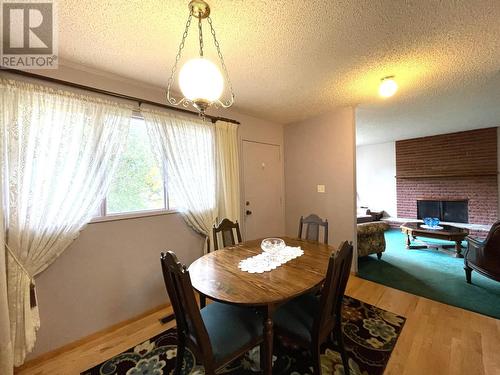 419 Third  Street, Nelson, BC - Indoor Photo Showing Dining Room With Fireplace