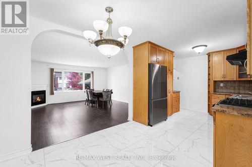 4650 Dorchester Road, Niagara Falls, ON - Indoor Photo Showing Kitchen With Fireplace