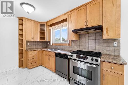 4650 Dorchester Road, Niagara Falls, ON - Indoor Photo Showing Kitchen With Double Sink