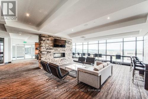 C322 - 330 Phillip Street, Waterloo, ON - Indoor Photo Showing Living Room With Fireplace