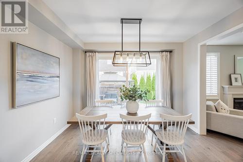 1178 Mceachern Court, Milton, ON - Indoor Photo Showing Dining Room With Fireplace