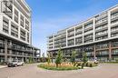 327 - 50 George Butchart Drive, Toronto, ON  - Outdoor With Balcony With Facade 