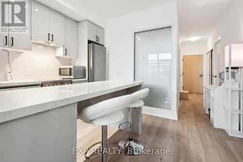 327 - 50 George Butchart Drive, Toronto, ON - Indoor Photo Showing Kitchen