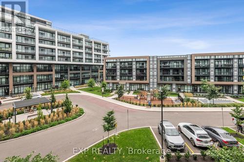 327 - 50 George Butchart Drive, Toronto, ON - Outdoor With Balcony With Facade