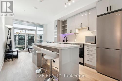 327 - 50 George Butchart Drive, Toronto, ON - Indoor Photo Showing Kitchen With Upgraded Kitchen