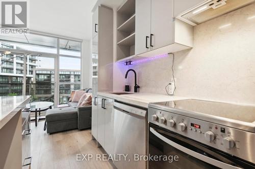 327 - 50 George Butchart Drive, Toronto, ON - Indoor Photo Showing Kitchen