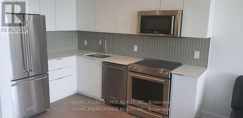 4709 - 30 Shore Breeze Drive, Toronto, ON - Indoor Photo Showing Kitchen