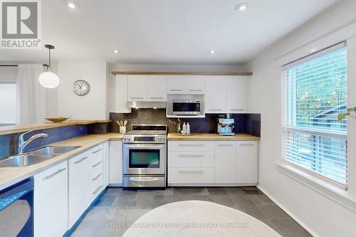 104 Lee Avenue, Toronto, ON - Indoor Photo Showing Kitchen With Double Sink