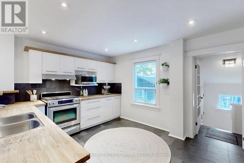 104 Lee Avenue, Toronto, ON - Indoor Photo Showing Kitchen With Double Sink