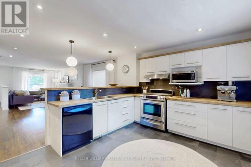 104 Lee Avenue, Toronto, ON - Indoor Photo Showing Kitchen With Double Sink