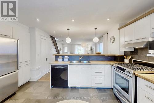 104 Lee Avenue, Toronto, ON - Indoor Photo Showing Kitchen With Double Sink