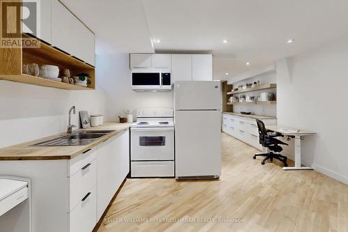 104 Lee Avenue, Toronto, ON - Indoor Photo Showing Kitchen With Double Sink