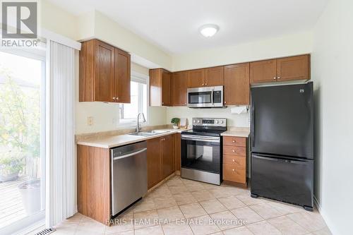 78 Stonemount Crescent, Essa, ON - Indoor Photo Showing Kitchen With Double Sink