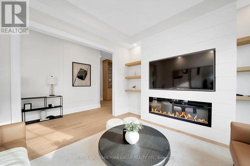 83 Elizabeth Grove, King, ON - Indoor Photo Showing Living Room With Fireplace