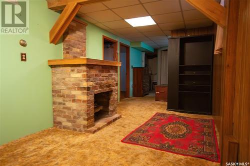 1462 105Th Street, North Battleford, SK - Indoor Photo Showing Other Room With Fireplace