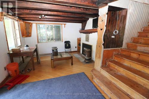 7692 Birch Drive, Ramara, ON - Indoor Photo Showing Other Room With Fireplace