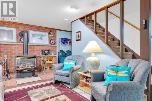 52 Charles Road, Tweed, ON - Indoor Photo Showing Other Room With Fireplace