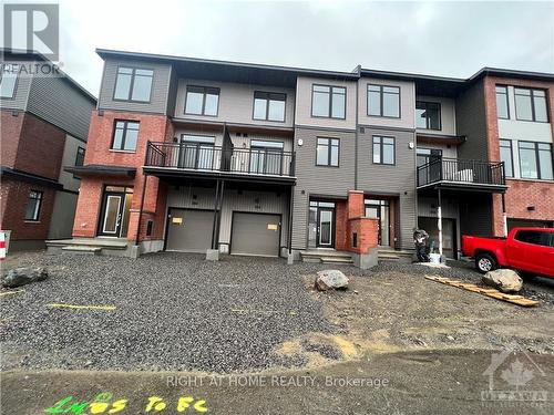 204 Tussock, Ottawa, ON - Outdoor With Balcony With Facade