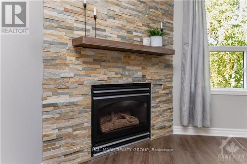 859 Nesting Way, Ottawa, ON - Indoor Photo Showing Living Room With Fireplace