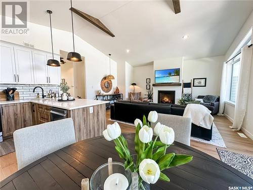 134 Rumberger Road, Candle Lake, SK - Indoor Photo Showing Dining Room With Fireplace