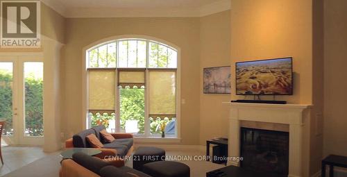 46 - 2014 Valleyrun Boulevard, London, ON - Indoor Photo Showing Living Room With Fireplace