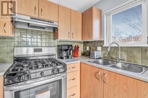 995 59 Avenue, Vancouver, BC - Indoor Photo Showing Kitchen With Double Sink