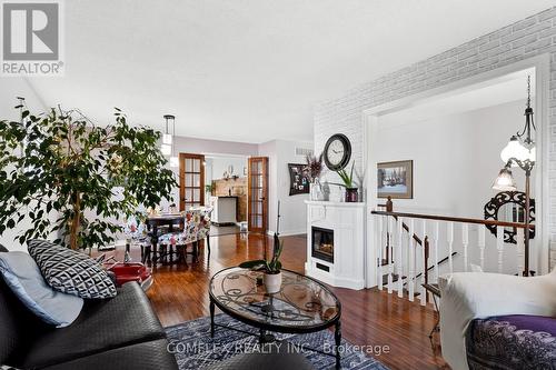 676 Ewing Street E, Cobourg, ON - Indoor Photo Showing Living Room With Fireplace