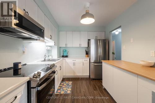 100 - 700 Osgoode Drive, London, ON - Indoor Photo Showing Kitchen With Stainless Steel Kitchen With Double Sink