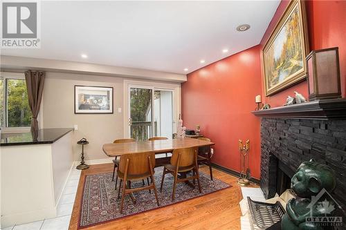 2545 Flannery Drive, Ottawa, ON - Indoor Photo Showing Dining Room With Fireplace