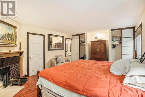 2545 Flannery Drive, Ottawa, ON - Indoor Photo Showing Bedroom With Fireplace