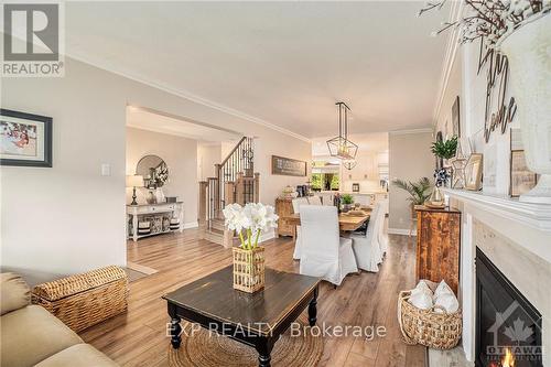 108 Lamadeleine Boulevard, Russell, ON - Indoor Photo Showing Living Room With Fireplace