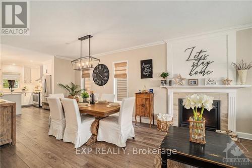 108 Lamadeleine Boulevard, Russell, ON - Indoor Photo Showing Dining Room With Fireplace