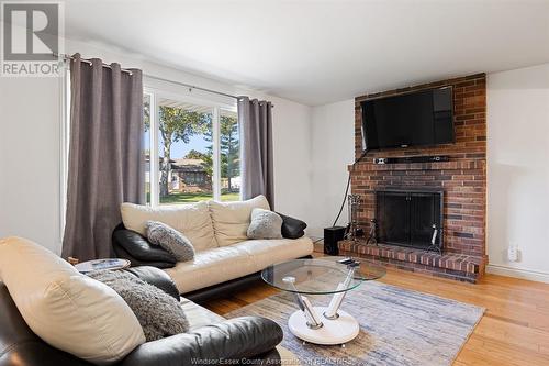 3181 Harmony Drive, Windsor, ON - Indoor Photo Showing Living Room With Fireplace