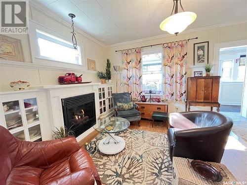 308 Jasper Street, Maple Creek, SK - Indoor Photo Showing Living Room With Fireplace