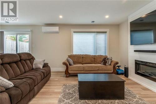 222 Teaberry Avenue, Moncton, NB - Indoor Photo Showing Living Room With Fireplace