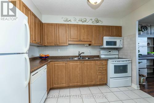 901 - 3501 Glen Erin Drive, Mississauga, ON - Indoor Photo Showing Kitchen With Double Sink