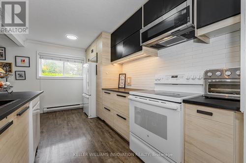 3 - 30 Flamingo Drive, Woolwich, ON - Indoor Photo Showing Kitchen