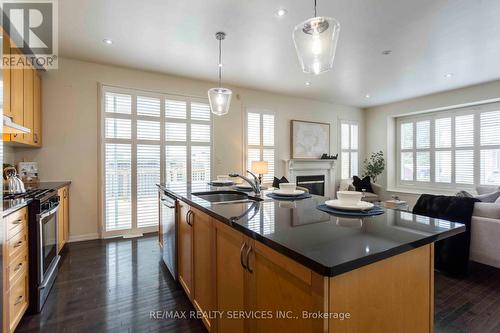 2 Kidd Crescent, New Tecumseth, ON - Indoor Photo Showing Kitchen With Fireplace