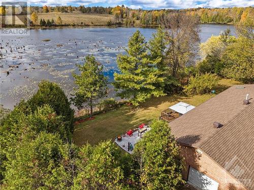 3396 Calabogie Road, Burnstown, ON - Outdoor With Body Of Water With View