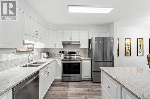 107 134 Fifth Ave E, Qualicum Beach, BC - Indoor Photo Showing Kitchen With Double Sink