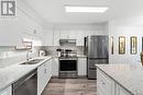 107 134 Fifth Ave E, Qualicum Beach, BC  - Indoor Photo Showing Kitchen With Double Sink 