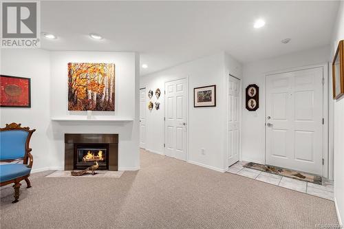 107 134 Fifth Ave E, Qualicum Beach, BC - Indoor With Fireplace