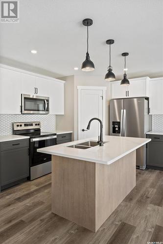 274 Fortosky Crescent, Saskatoon, SK - Indoor Photo Showing Kitchen With Stainless Steel Kitchen With Double Sink With Upgraded Kitchen