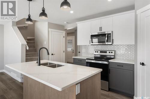 274 Fortosky Crescent, Saskatoon, SK - Indoor Photo Showing Kitchen With Stainless Steel Kitchen With Double Sink With Upgraded Kitchen